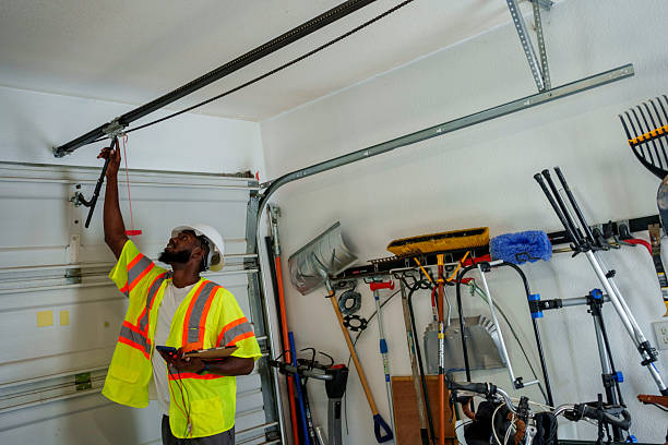 Professional Garage Door Panel Replacement technician working in Cloverdale, IN